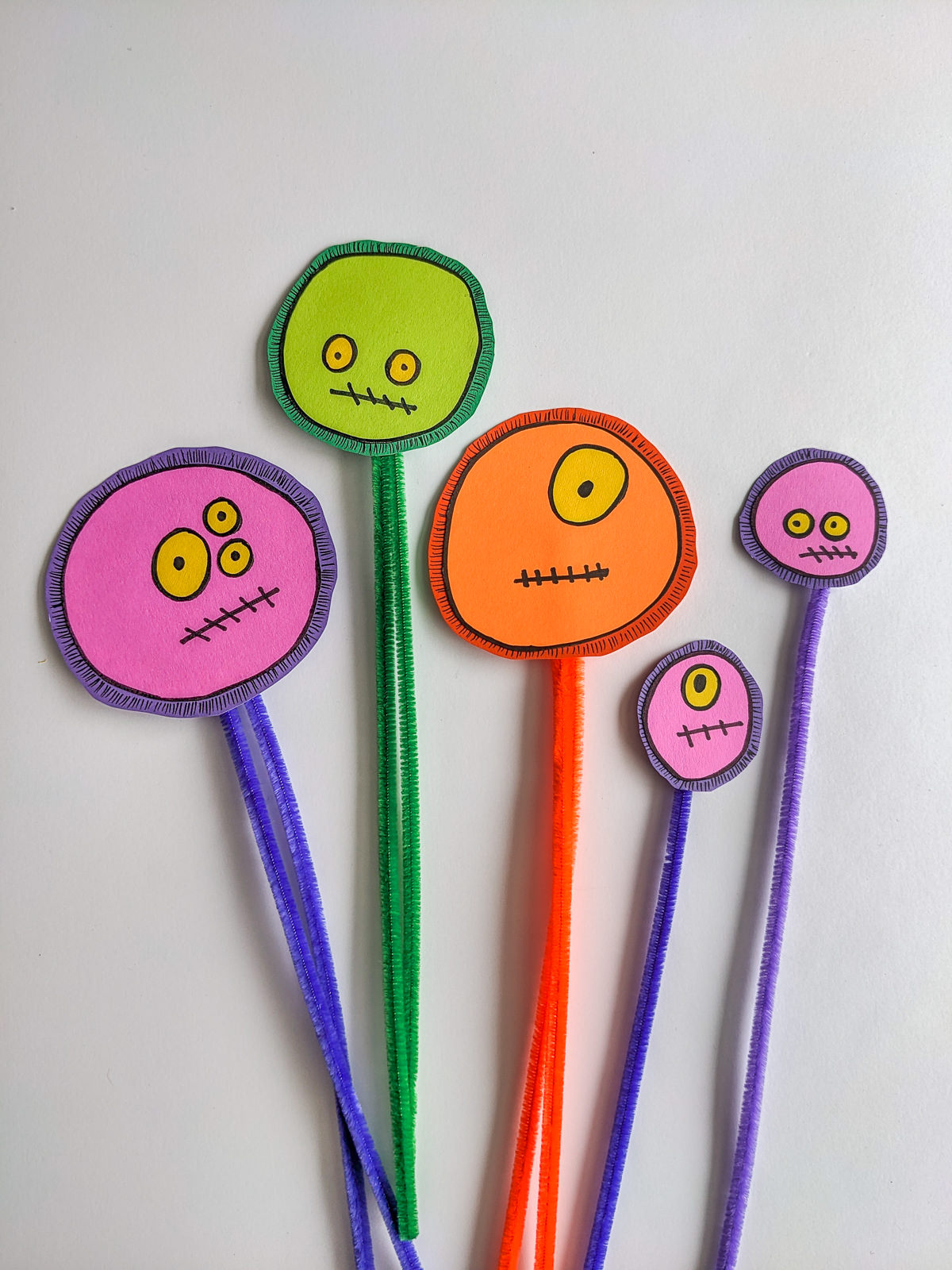 Halloween plant stakes with silly monster faces