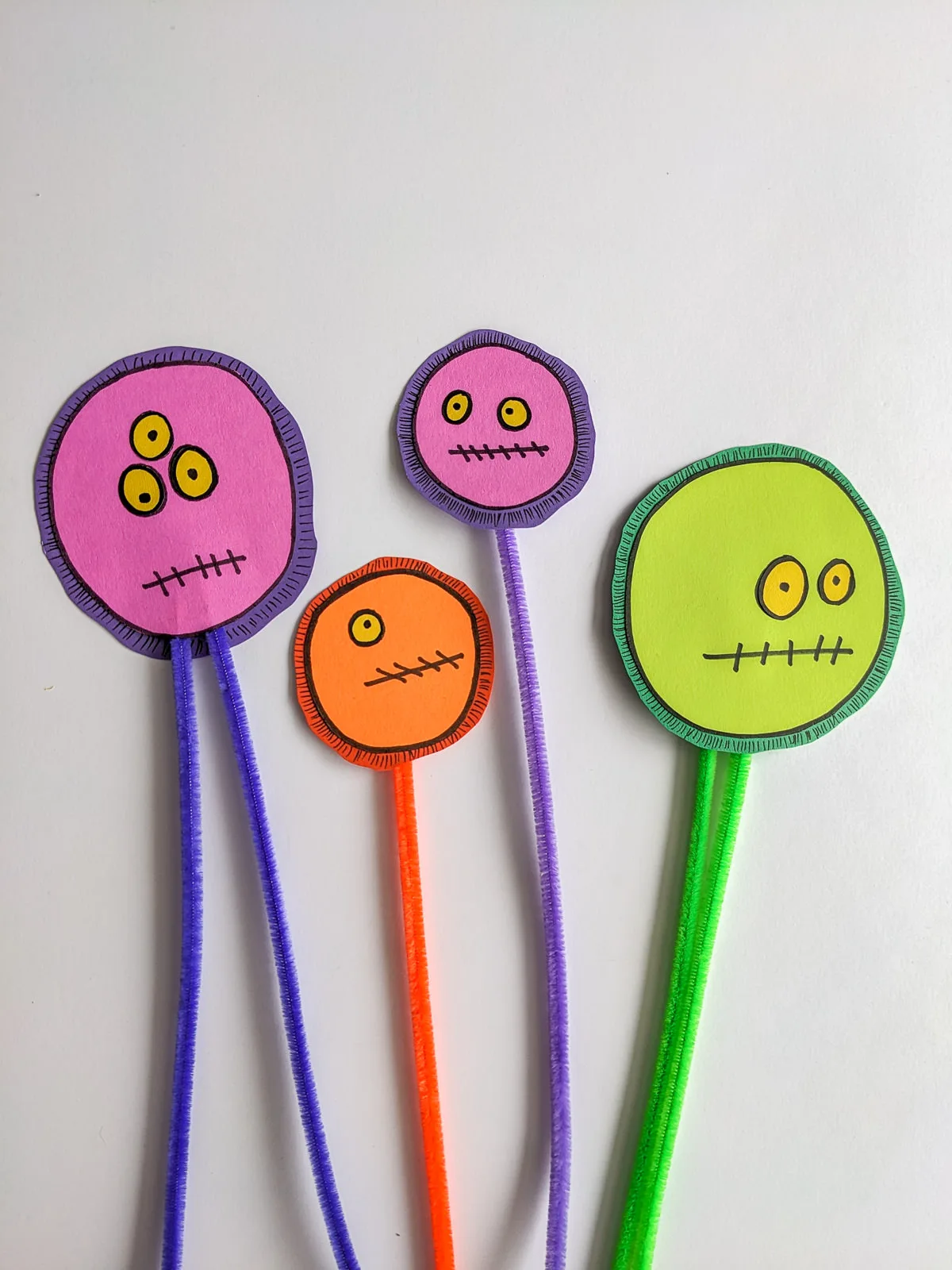 Halloween plant stakes with silly monster faces