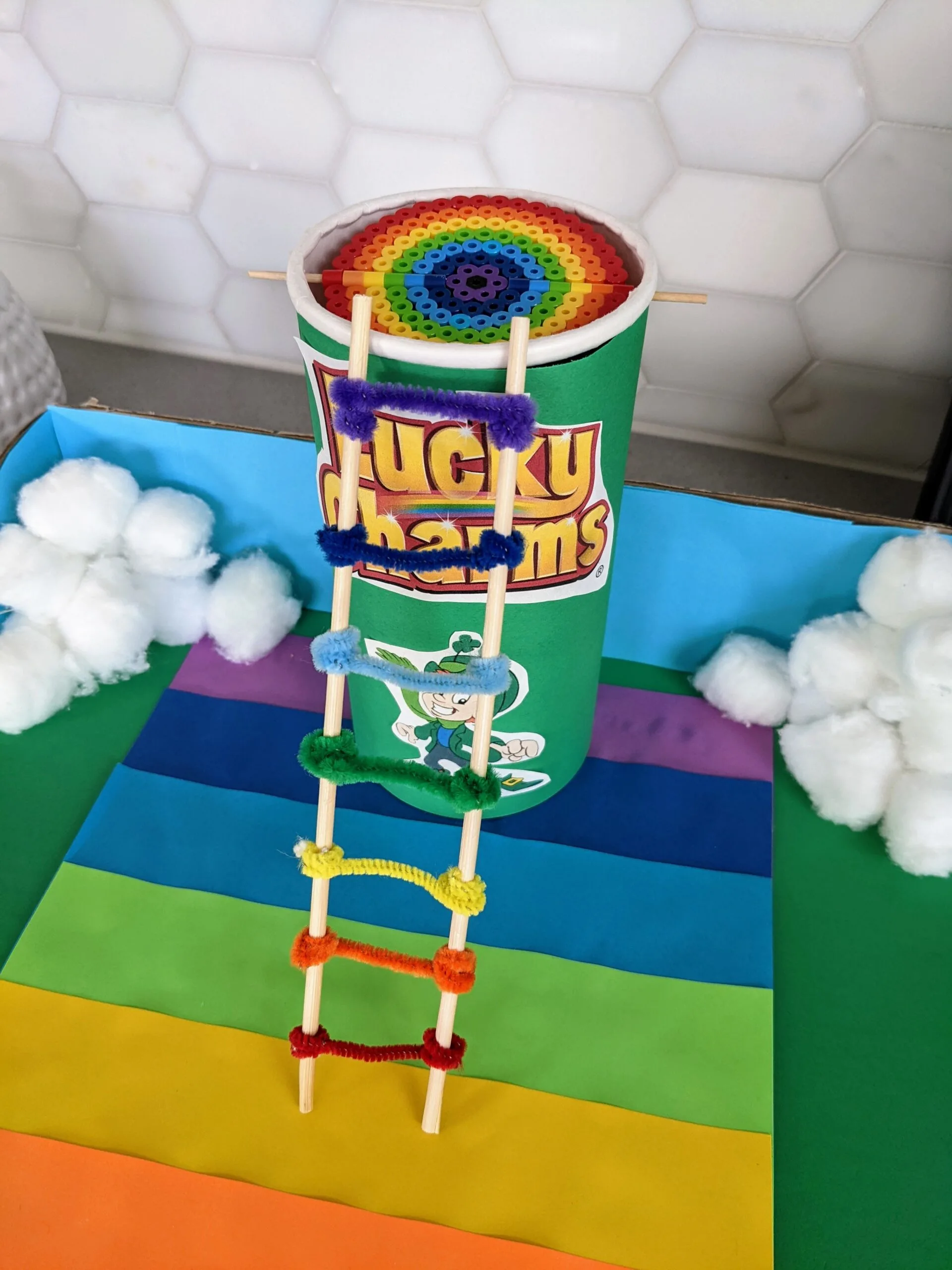 Leprechaun trap with a rainbow ladder and rainbow trap door