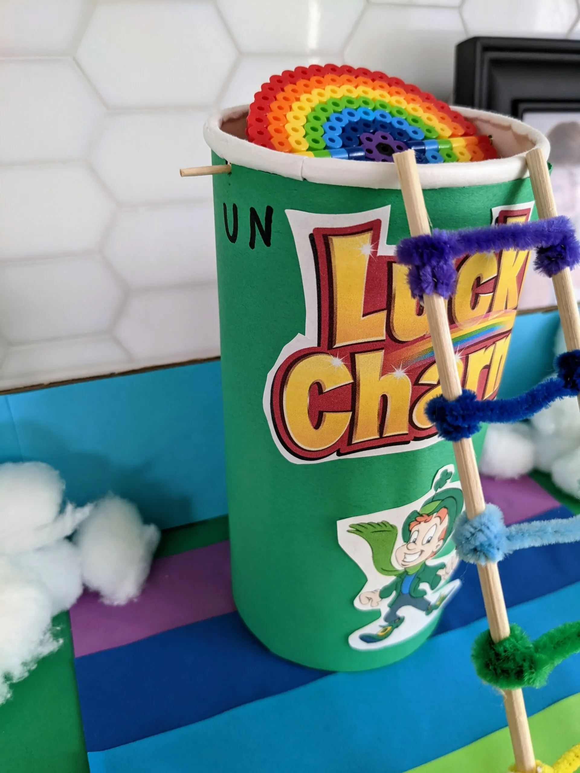 Leprechaun trap with a rainbow ladder and rainbow trap door