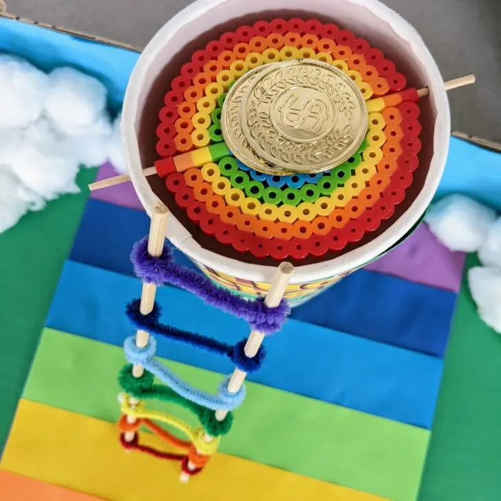 Leprechaun trap with a rainbow ladder and rainbow trap door