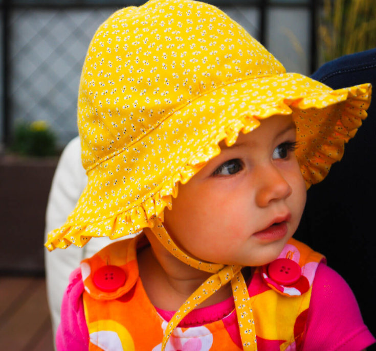 Free baby bonnet pattern: Baby sun hat sewing pattern with ruffles and