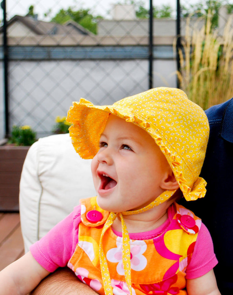 free-baby-bonnet-pattern-baby-sun-hat-sewing-pattern-with-ruffles-and-ties-merriment-design