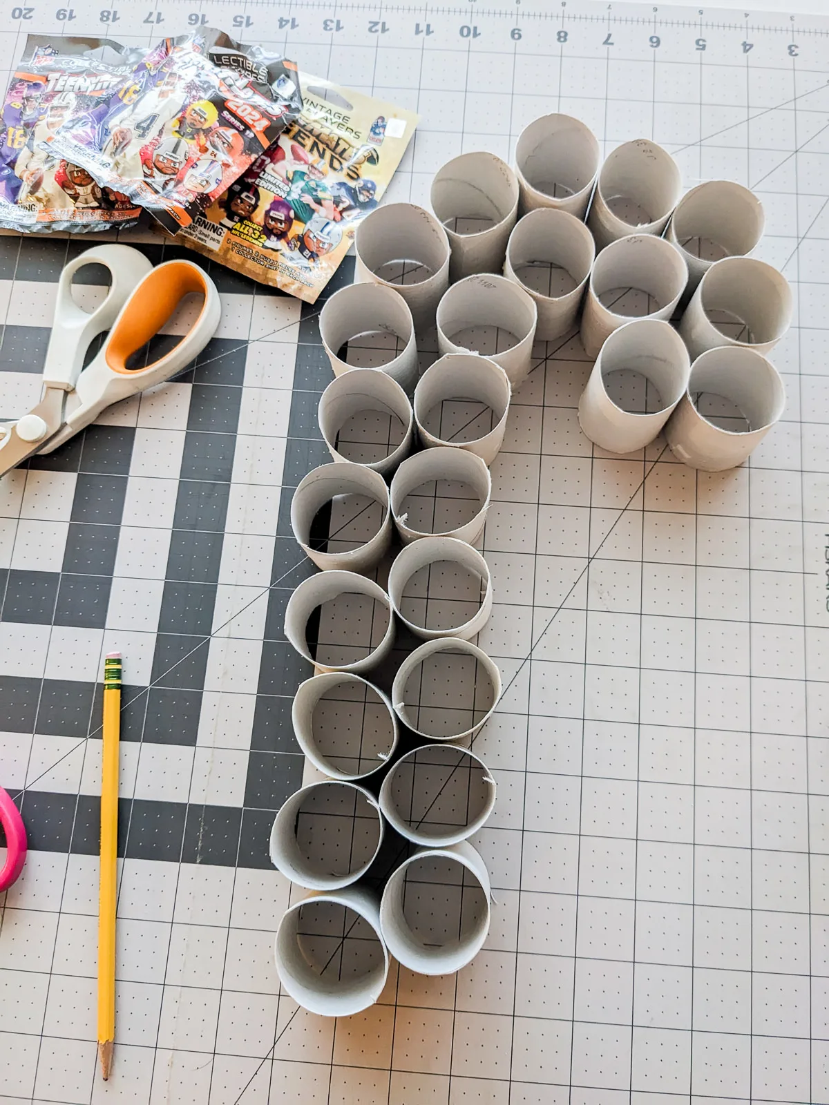 Toilet paper rolls handmade advent calendar in the shape of a candy cane