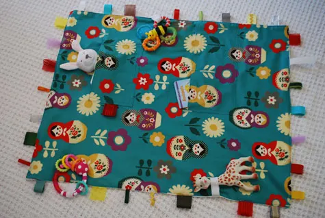 Merriment :: Kid's Travel Toy Blanket with Velcro Loops and Ribbon Tags free DIY tutorial and pattern template craft project for Merriment Design by Kathy Beymer at MerrimentDesign.com