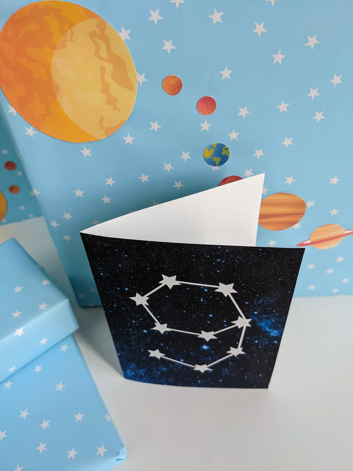 Outer space birthday card printable PDF with an age 9 star constellation on a blue galaxy background