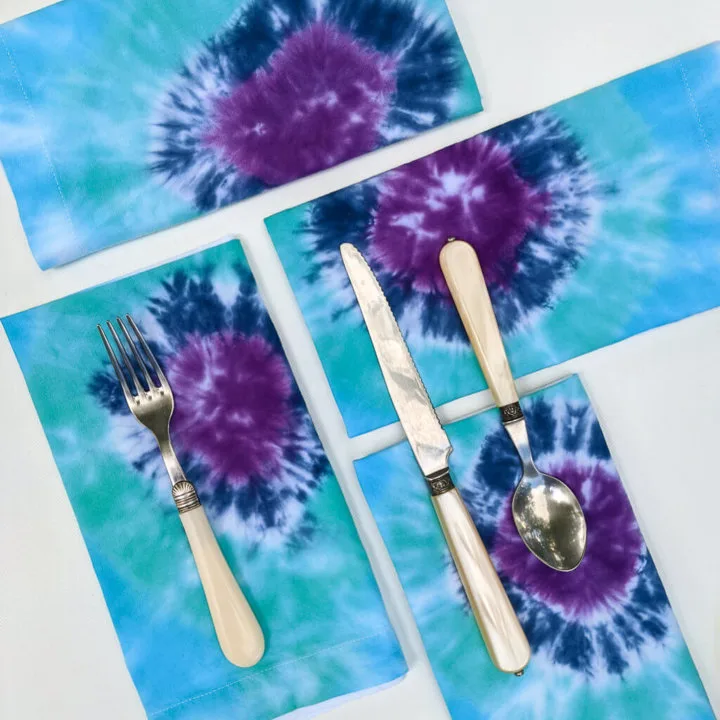 DIY tie-dye cloth napkins in indigo, turquoise blue, and purple